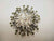 J62051-Magnetic Broach - Star Burst  Black